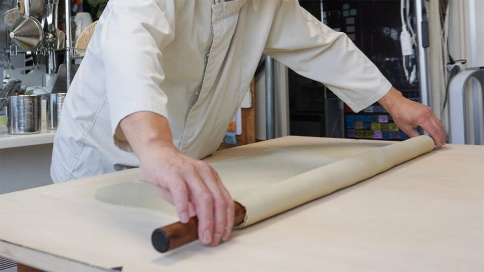 rolling out soba dough